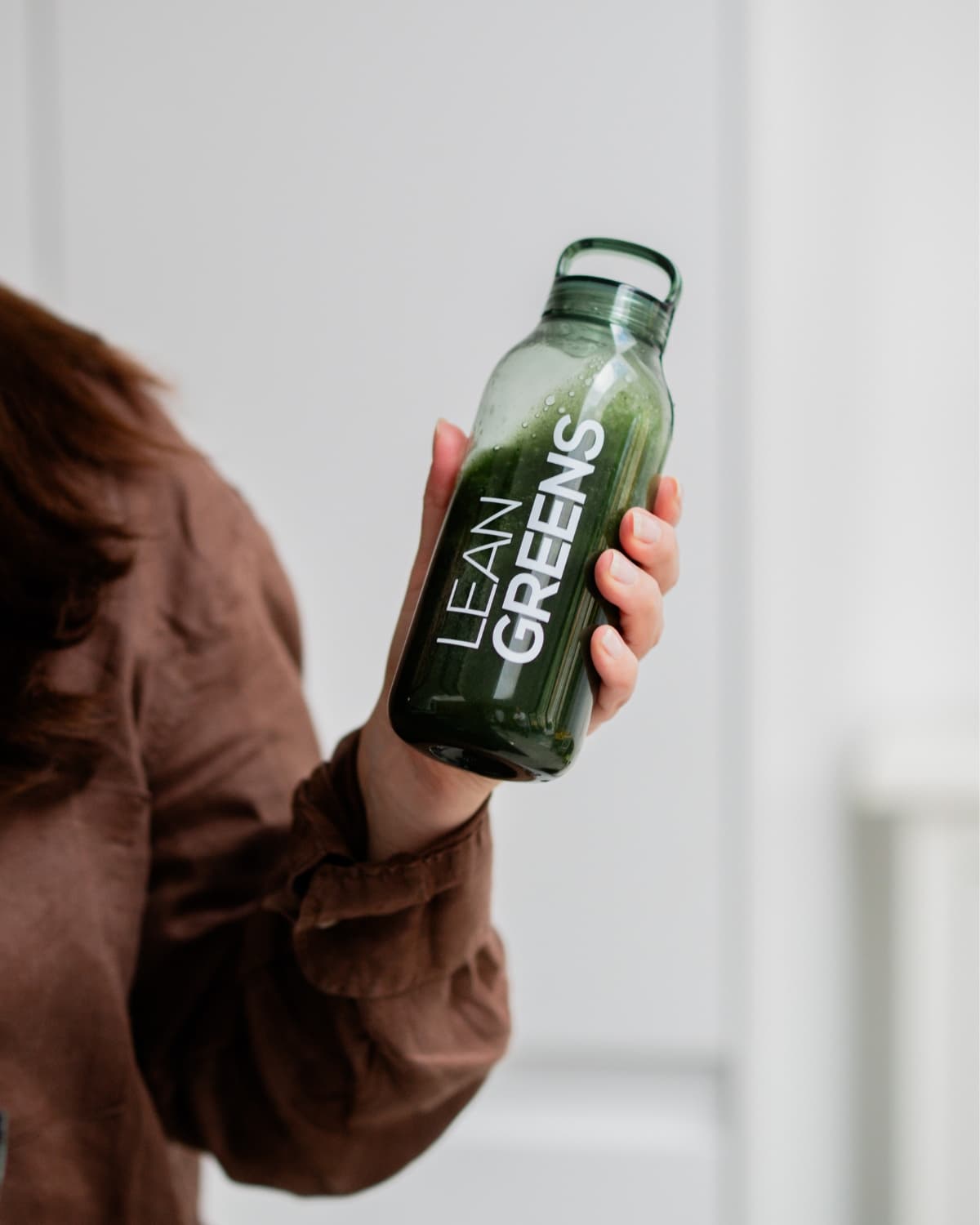 Mixing Collagen Greens in a shaker bottle